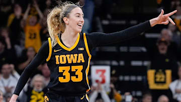 Iowa Hawkeyes guard Lucy Olsen (33) reacts after a made Hawkeye three-point basket during a Big Ten women’s basketball game against the USC Trojans Sunday, Feb. 2, 2025 at Carver-Hawkeye Arena in Iowa City, Iowa.