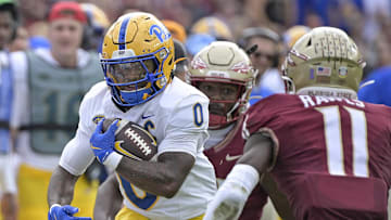 Oct 11, 2025; Tallahassee, Florida, USA; Pittsburgh Panthers running back Desmond Reid (0) runs the ball during the first quarter against the Florida State Seminoles at Doak S. Campbell Stadium. Mandatory Credit: Melina Myers-Imagn Images