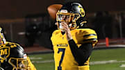 Matt Ponatoski eyes a touchdown pass for Moeller during the OHSAA Division I football regional semifinals Nov. 15, 2024, at Dwire Field in Mason, Ohio.