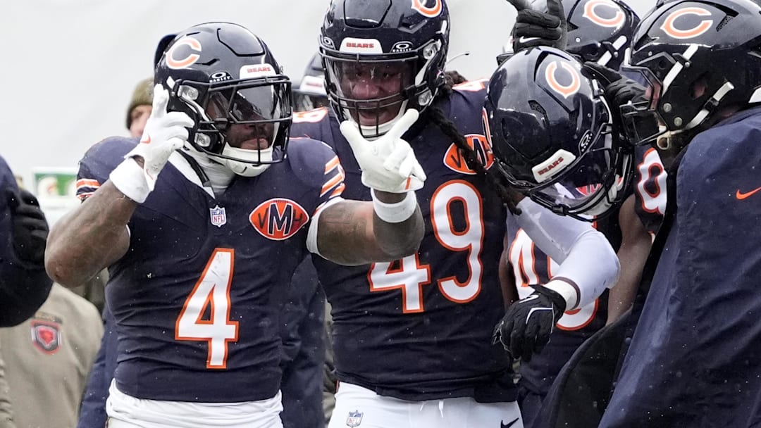 Nov 9, 2025; Chicago, Illinois, USA; Chicago Bears running back D'Andre Swift (4) celebrates after a first down during the first half against the New York Giants at Soldier Field.