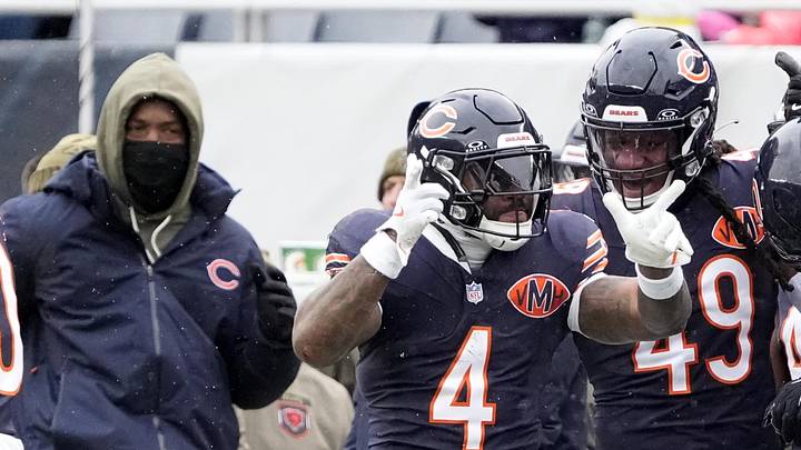 Nov 9, 2025; Chicago, Illinois, USA; Chicago Bears running back D'Andre Swift (4) celebrates after a first down during the first half against the New York Giants at Soldier Field.