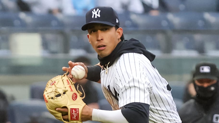 New York Yankees third baseman Oswaldo Cabrera throws a ball to attempt to make an out. | Tom Horak-Imagn Images
