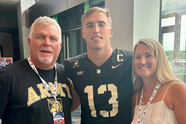 Bryson, center, with his parents, Darrell and Christi.