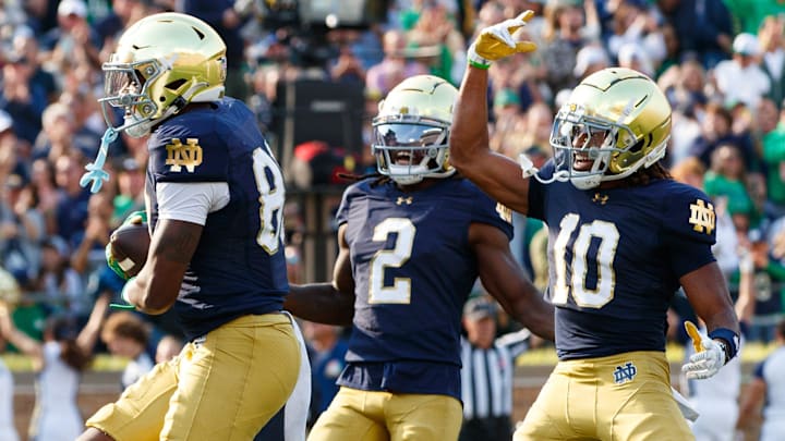 Notre Dame wide receiver Jayden Thomas (83), wide receiver Jayden Harrison (2) and wide receiver Kris Mitchell (10) celebrate a touchdown scored by Thomas during a NCAA college football game between Notre Dame and Stanford at Notre Dame Stadium on Saturday, Oct. 12, 2024, in South Bend. Notre Dame wide receiver Jayden Thomas (83), wide receiver Jayden Harrison (2) and wide receiver Kris Mitchell (10) celebrate a touchdown scored by Thomas during a NCAA college football game between Notre Dame and Stanford at Notre Dame Stadium on Saturday, Oct. 12, 2024, in South Bend.
