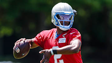 Detroit Lions quarterback Hendon Hooker (2) practices during OTAs at Detroit Lions headquarters and practice facility in Allen Park on Tuesday, June 11, 2024.