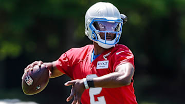 Detroit Lions quarterback Hendon Hooker (2) practices during OTAs at Detroit Lions headquarters and practice facility in Allen Park on Tuesday, June 11, 2024.