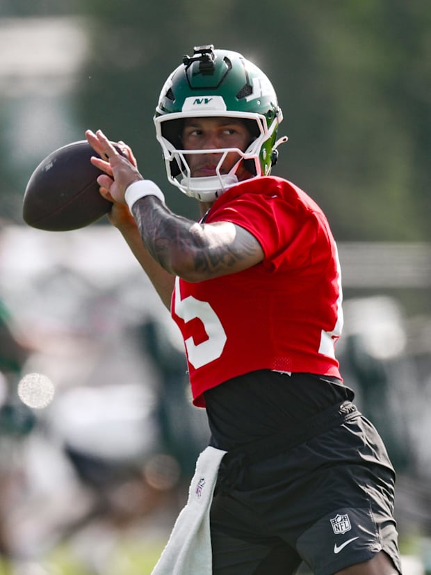 New York Jets quarterback Adrian Martinez (15) participates in a drill during training camp