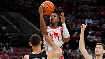 Ohio State Buckeyes guard Meechie Johnson Jr. (1) shoots over Campbell Fighting Camels forward Eric Van Der Heijden (23) during the second half of the NCAA men's basketball game at Value City Arena in Columbus on Friday, Nov. 22, 2024. Ohio State won 104-60.