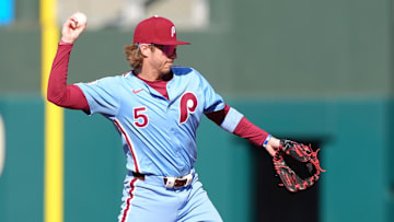 Apr 17, 2025; Philadelphia, Pennsylvania, USA; Philadelphia Phillies infielder Bryson Stott (5) throws to first against the San Francisco Giants in the second inning at Citizens Bank Park.