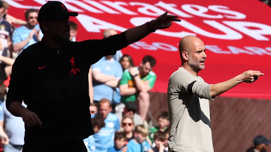 Jürgen Klopp (left) and Pep Guardiola pointing.