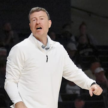 Nov 3, 2025; Nashville, Tennessee, USA;  Vanderbilt Commodores head coach Mark Byington yells to his team against the Lipscomb Bisons during the second half at Memorial Gymnasium. Mandatory Credit: Steve Roberts-Imagn Images