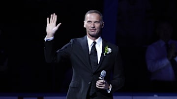 Dominik Hašek waves to the Sabres' crowd before his jersey retirement ceremony in 2015.