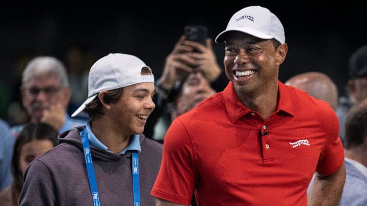 January 14, 2025: Charlie and Tiger Woods smile during warmups at SoFi Center during golf match between Jupiter Links and Los Angeles Golf Club in the TGL. January 14, 2025: Charlie and Tiger Woods smile during warmups at SoFi Center during golf match between Jupiter Links and Los Angeles Golf Club in the TGL.