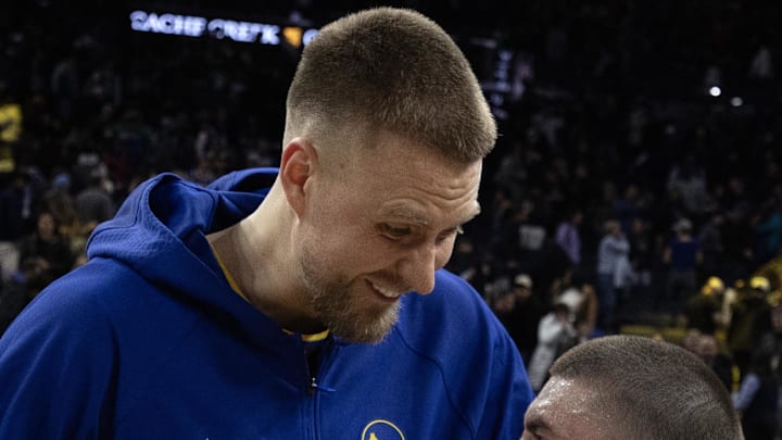 Feb 19, 2026; San Francisco, California, USA; Golden State Warriors center Kristaps Porzingis (left) shares a laugh with Boston Celtics guard Payton Pritchard (11) following their game at Chase Center. Mandatory Credit: D. Ross Cameron-Imagn Images