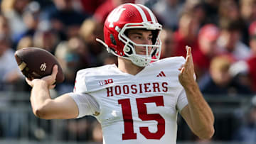 Nov 8, 2025; University Park, Pennsylvania, USA; Indiana Hoosiers quarterback Fernando Mendoza (15) throws a pass during the first quarter against the Penn State Nittany Lions at Beaver Stadium. Mandatory Credit: Matthew O'Haren-Imagn Images