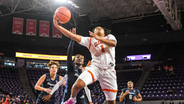 Clemson guard Dayshanette Harris (1) scores near Longwood guard Bailey Williams (2) during the first quarter at Littlejohn Coliseum in Clemson, S.C. Sunday, November 19, 2023.