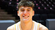 Tennessee forward JP Estrella (13) smiles at the Food City Center for Tennessee Basketball media day on Tuesday Oct. 3, 2023.