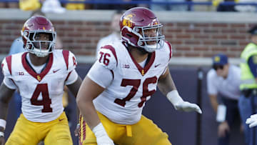 Sep 21, 2024; Ann Arbor, Michigan, USA;  USC Trojans offensive lineman Mason Murphy (76) blocks against the Michigan Wolverines at Michigan Stadium. Mandatory Credit: Rick Osentoski-Imagn Images