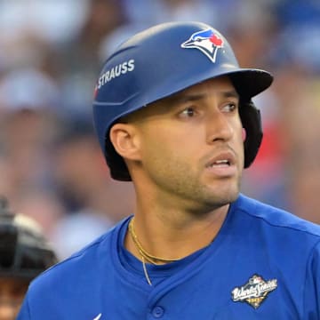 Oct 27, 2025; Los Angeles, California, USA; Toronto Blue Jays right fielder George Springer (4) reacts after striking out against the Los Angeles Dodgers in the first inning during game three of the 2025 MLB World Series at Dodger Stadium. 