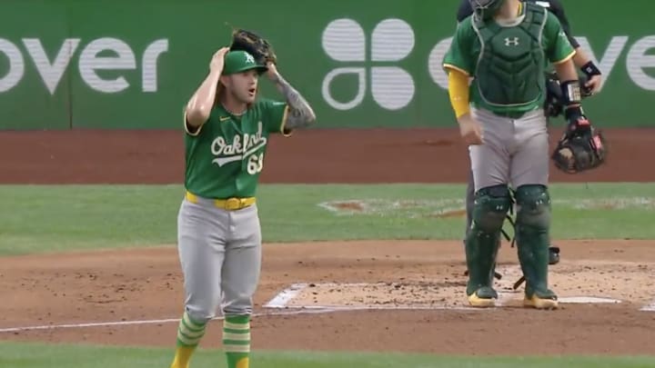 Oakland A’s pitcher Joey Estes reacts to a base hit.