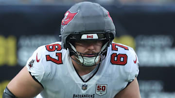 Aug 16, 2025; Pittsburgh, Pennsylvania, USA;  Tampa Bay Buccaneers offensive tackle Luke Goedeke (67) at the line of scrimmage against the Pittsburgh Steelers during the first quarter at Acrisure Stadium. Mandatory Credit: Charles LeClaire-Imagn Images