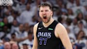 May 24, 2024; Minneapolis, Minnesota, USA; Dallas Mavericks guard Luka Doncic (77) reacts in the fourth quarter against the Minnesota Timberwolves during game two of the western conference finals for the 2024 NBA playoffs at Target Center. Mandatory Credit: Jesse Johnson-Imagn Images