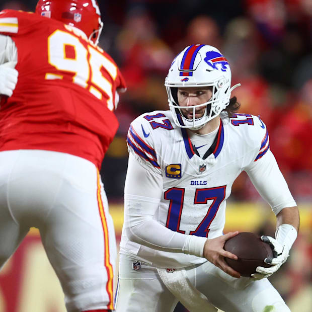 Josh Allen (17) rushes the ball