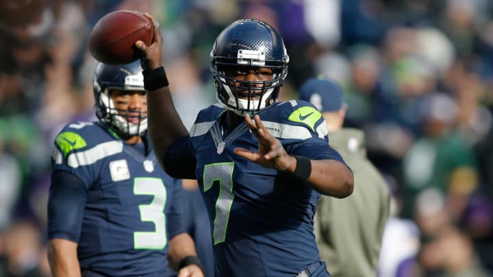 Nov 17, 2013; Seattle, WA, USA; Seattle Seahawks quarterback Tarvaris Jackson (7) throws during pregame warmups against the Minnesota Vikings at CenturyLink Field. Mandatory Credit: Joe Nicholson-USA TODAY Sports