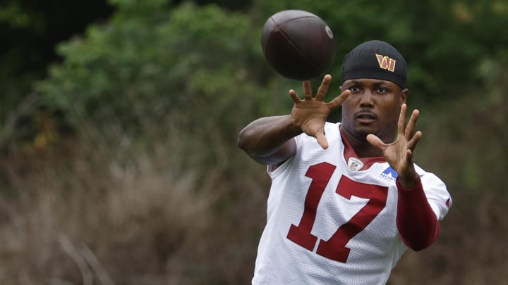 Jun 5, 2024; Ashburn, VA, USA; Washington Commanders wide receiver Terry McLaurin (17) catches a ball during warmup prior to an OTA workout at Commanders Park. Mandatory Credit: Geoff Burke-USA TODAY Sports