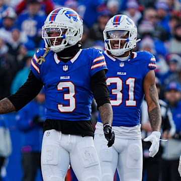 Buffalo Bills safety Damar Hamlin smiles after almost intercepting a. Pass during the second half of the Buffalo Bills wild card game against the Denver Broncos at Highmark Stadium in Orchard Park on Jan. 12, 2025. Behind him are teammates Buffalo Bills cornerback Rasul Douglas and Buffalo Bills cornerback Cam Lewis.