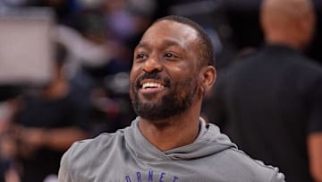 Feb 24, 2025; Sacramento, California, USA; Former Charlotte Hornets guard Kemba Walker smiles before the game against the Sacramento Kings at Golden 1 Center. Mandatory Credit: Ed Szczepanski-Imagn Images