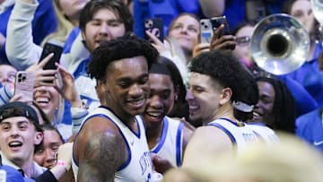 Kentucky's players celebrated with fans after they defeated Tennessee during their game at Rupp Arena in Lexington, Ky. on Feb. 11, 2025.