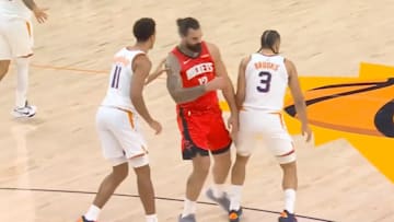 Dillon Brooks shoulder checks former teammate Steven Adams.