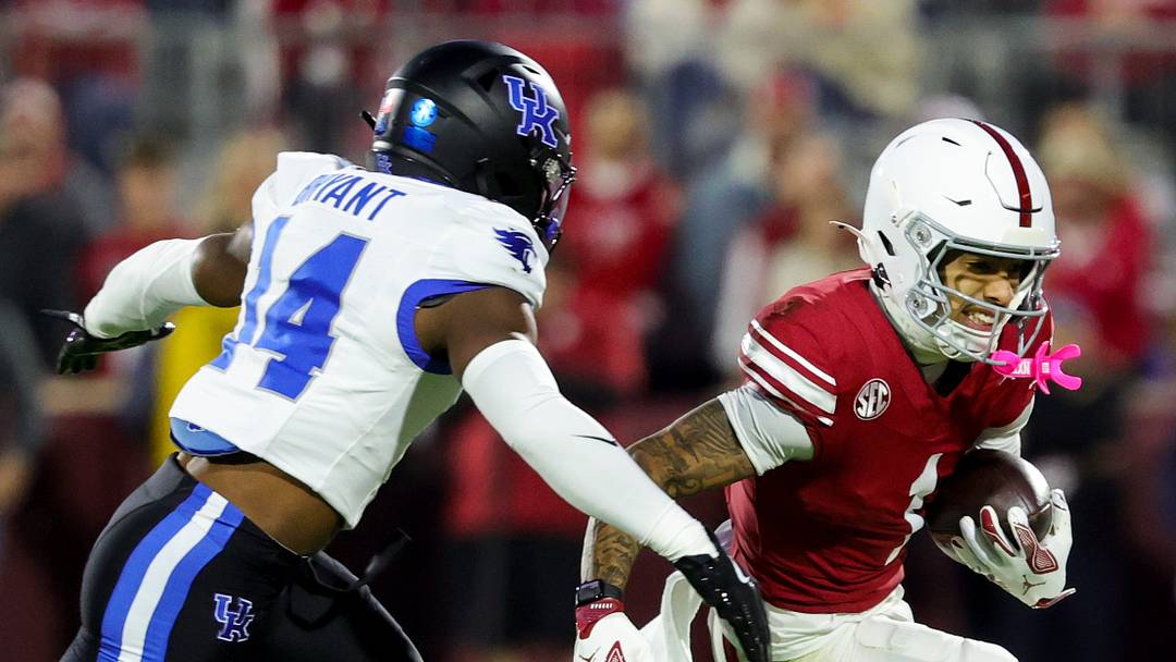 Oklahoma wide receiver Isaiah Sategna III runs against Kentucky defensive back Ty Bryant. Oklahoma wide receiver Isaiah Sategna III runs against Kentucky defensive back Ty Bryant.