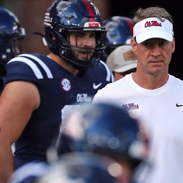 Mississippi Rebels head coach Lane Kiffin looks on during warm ups prior to the game against The Citadel Bulldogs at Vaught-Hemingway Stadium.