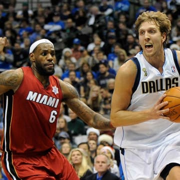 Dec 25, 2011; Dallas, TX, USA; Dallas Mavericks power forward Dirk Nowitzki (right) drives past Miami Heat small forward LeBron James (6) during the second quarter at the American Airlines Center. Mandatory Credit: Jerome Miron-USA TODAY Sports