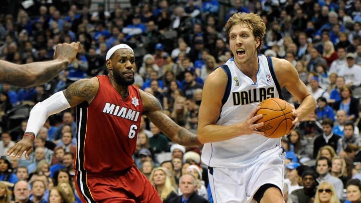 Dec 25, 2011; Dallas, TX, USA; Dallas Mavericks power forward Dirk Nowitzki (right) drives past Miami Heat small forward LeBron James (6) during the second quarter at the American Airlines Center. Mandatory Credit: Jerome Miron-USA TODAY Sports