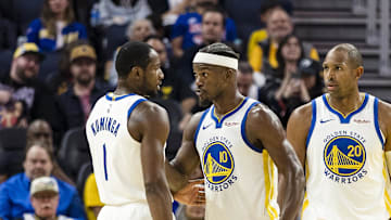 Oct 8, 2025; San Francisco, California, USA;  Golden State Warriors forward Jimmy Butler III (10) reacts  towards forward Jonathan Kuminga (1) during the second quarter against the Portland Trail Blazers at Chase Center. Mandatory Credit: John Hefti-Imagn Images