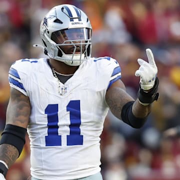 Nov 24, 2024; Landover, Maryland, USA; Dallas Cowboys linebacker Micah Parsons (11) gestures to the bench against the Washington Commanders at Northwest Stadium. Mandatory Credit: Geoff Burke-Imagn Images