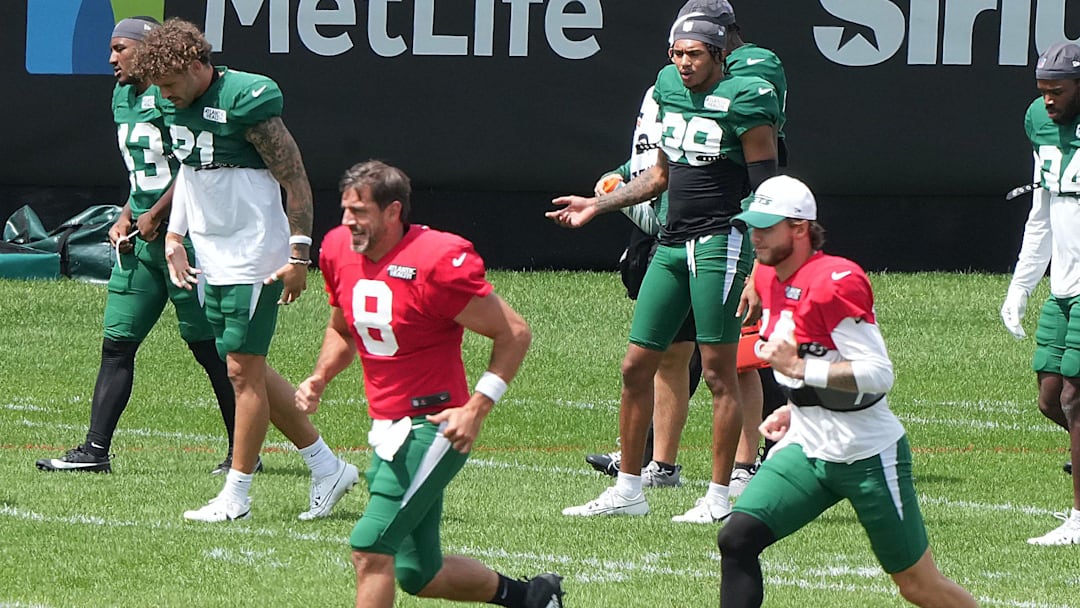 Florham Park, NJ -- August 21, 2024 -- Jets quarterbacks Aaron Rodgers and Andrew Peasley during practice. The New York Giants came to the Atlantic Health Jets Training Center in Florham Park, New Jersey to take part in a joint practice with the New York Jets.