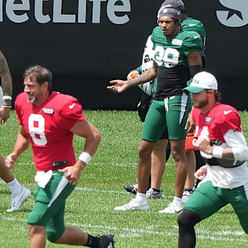 Florham Park, NJ -- August 21, 2024 -- Jets quarterbacks Aaron Rodgers and Andrew Peasley during practice. The New York Giants came to the Atlantic Health Jets Training Center in Florham Park, New Jersey to take part in a joint practice with the New York Jets.