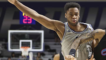 Jan 24, 2024; Houston, Texas, USA; Florida Atlantic Owls guard Nick Boyd (2) drives with the ball as Rice Owls guard Noah Shelby (1) defends during the first half at Tudor Fieldhouse. Mandatory Credit: Troy Taormina-Imagn Images