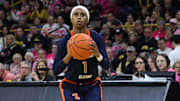 Feb 25, 2024; Iowa City, Iowa, USA; Illinois Fighting Illini guard Genesis Bryant (1) shoots against the Iowa Hawkeyes during the second half at Carver-Hawkeye Arena. Mandatory Credit: Reese Strickland-Imagn Images