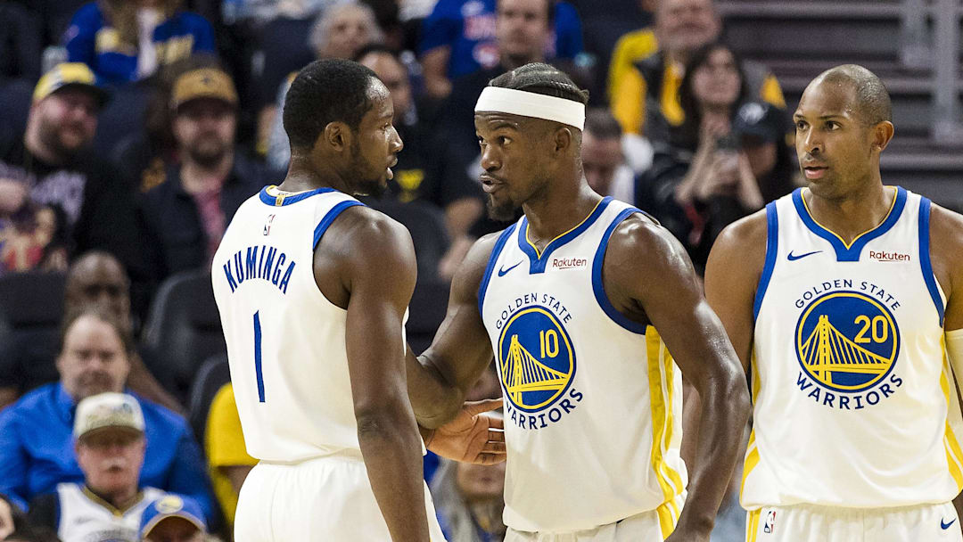 Oct 8, 2025; San Francisco, California, USA;  Golden State Warriors forward Jimmy Butler III (10) reacts  towards forward Jonathan Kuminga (1) during the second quarter against the Portland Trail Blazers at Chase Center. Mandatory Credit: John Hefti-Imagn Images