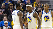 Oct 8, 2025; San Francisco, California, USA;  Golden State Warriors forward Jimmy Butler III (10) reacts  towards forward Jonathan Kuminga (1) during the second quarter against the Portland Trail Blazers at Chase Center. Mandatory Credit: John Hefti-Imagn Images
