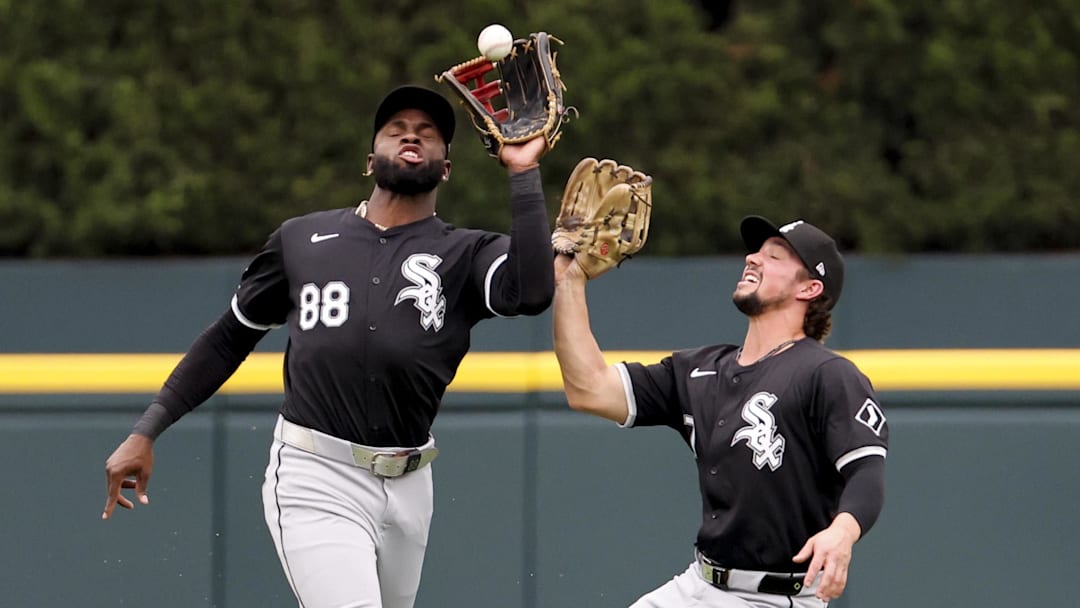 Sep 29, 2024; Detroit, Michigan, USA;  Chicago White Sox center fielder Luis Robert Jr. (88) makes a catch in front of center fielder Dominic Fletcher (7) in the first inning against the Detroit Tigers at Comerica Park. 