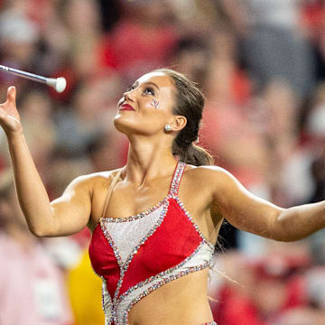 A baton twirler performs during halftime of the Nebraska-Northern Iowa game.