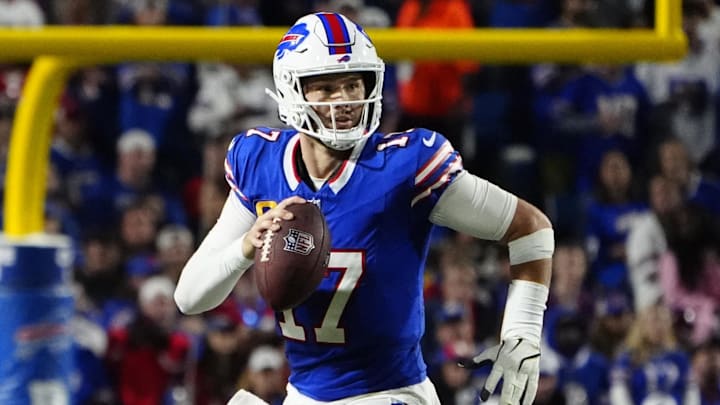 Buffalo Bills quarterback Josh Allen runs with the ball against the Jacksonville Jaguars during the second half of Monday's game at Highmark Stadium.