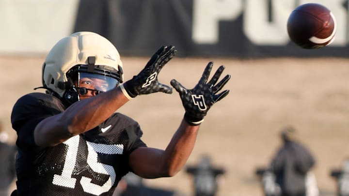 Purdue Boilermakers wide receiver Nathan Leacock (15) catches a pass Purdue Boilermakers wide receiver Nathan Leacock (15) catches a pass
