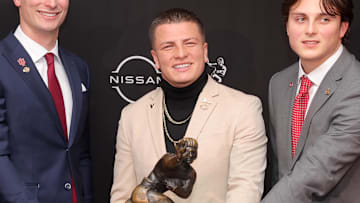 Vanderbilt Commodores quarterback Diego Pavia with the Heisman Trophy